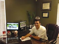 David Merriman, State Farm agent, reserves a place at his desk for you to 
help review your insurance needs.
