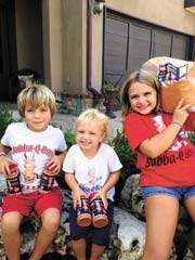 Aiden, Avery and Addy, Bubba-Q-Boys “taste testers.”