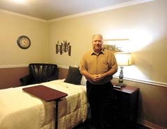 Scott Pilgrim, managing member, in one of the ten luxury rehabilitation rooms at North County.