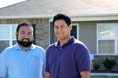 RCB Bank Mortgage Officer Derek Robinson with Abe Munoz, new homeowner in Broken Arrow.