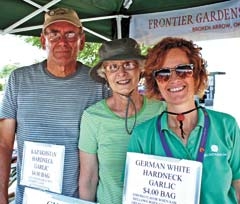 Frontier Gardens owners David and Linda Hickey with Farmers Market Coordinator Judy Prieto.