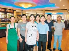 The Buffet City family (L to R): Lucy, Hengyu “Teddy” Zhu, Ling Chen, Yu Ping, Xia Chen, Fei Di and Chang Fu Zhu.