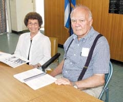 Peggy Belbas and Constantine “Deno” Michalopulos share a half century of memories of the Holy Trinity Greek Orthodox Church’s annual festivals. Deno still has his first ticket.