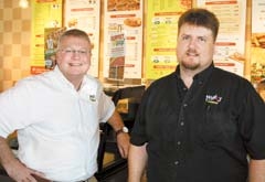 Mark Long, senior director of operations and franchisee ­services for Mazzio’s, with John Sharp, managing partner of the Mazzio’s Italian Eatery at 145th &amp; Kenosha in Broken Arrow.