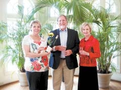 Members of the Tulsa Garden Center have been busy preparing for An Evening of Wine & Roses. (L to R): Barbie Raney, Tulsa Garden Center executive director, Scott Davidson, Wine & Roses committee member, and Debbie Kirkpatrick, Wine & Roses chair.