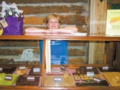 Owner Hazel Ward shows off some of the delicious fudge available at The Nut House.