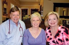 Dr. James Campbell (L) and Malissa Spacek (R) welcome Olga Strickland (Center) to BA Med Spa &amp; Weight Loss Center.