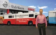 General Manager Ken Wilkins takes part in a life-saving blood drive hosted by Bob Moore Nissan of Tulsa.