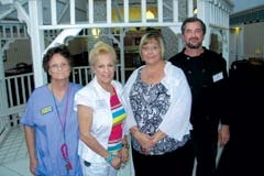 The staff of Heartland Plaza includes (L to R): Sherry Sparling, certified medication aide; Karen Killingsworth, activities director; Ronni Nuessen, administrator; and Tim Smith, dietary manager.