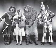 The Scarecrow, Dorothy, Cowardly Lion, and Tin Man are off to see the Wizard.