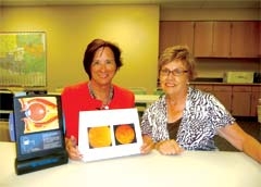 Judy Riley, OD, and Fran Hrdlicka, RN, show the effects of diabetes on the eyes.