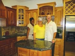 Office Manager Angela Mack, General Manager 
Michelle Hawksworth, and Owner Greg Strange in Countertop Solution’s beautiful showroom.
