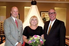 Jeff Kelley, general manager of the Hyatt Regency; Phyllis Kennedy, C&amp;K committee member; and Tom Warburton, event emcee.