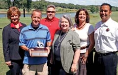 The Guns & Hoses Golf Tournament committee (L to R): Kittie Dishman (Golf Club of Oklahoma), Kevin Leaver (TPD), John and Janie Kleibert (J&J Unlimited), Kathy Hefley (Espo Fire & Water Restoration), and Bryan Myrick (BAFD). Not pictured: Buzz Morrill (BAPD), Lou Ann Marlar (Youth at Heart) and Charlie Ogle (Servicemaster).