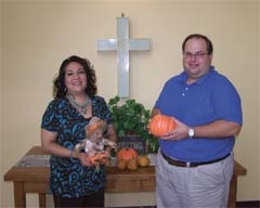 Velma Carriaga, missions and outreach coordinator, and Pastor Brian Mangan of Meadowcreek United Methodist Church.