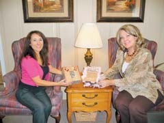 Kerrie Long, ND, program and client services manager, and Susan Bramsch, executive director, show examples of memory boxes clients make in workshops at The Tristesse Grief Center.