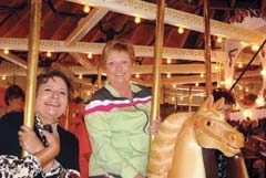Lori Nuzum (right) and Celeste Tillery at the Herchell Carousel Museum in Buffalo, New York on the Niagara Falls tour, 2012.