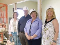 (L to R): Tia Stout, Allen Stout, Reverend Jannell Brammer and Kathy Geyer in the new Safenet Services facility.