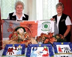 ESA Alpha Rho publicity committee co-chairs JoAnn Bierig and Bev Schwarzkopf show off some of their favorite crafts.