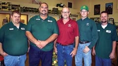 The management team at P&amp;K Equipment in Owasso includes (L to R): Service Manager Eric Gier, Ag Shop Foreman Fred Peters, Site Manager Randal Bobbitt, Parts Manager Dennis ­Kastner, and Lawn &amp; Garden Service Foreman Chris Scarpa.