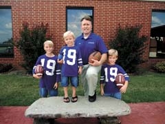 Dr. Brad Lawson with his sons, Luke, John and Ethan.