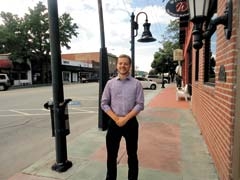 Nick DeMoss, director of communications for the Jenks Chamber of Commerce,
in downtown Jenks.