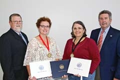 From left: Dr. Frank Elwell, dean of RSU\'s School of Liberal Arts; Dr. Sally Emmons, Herrington Excellence in Teaching Award; Dr. Mary Mackie, Pixley Excellence in Education Award and Herrington Excellence in Service Award; and RSU President Dr. Larry Rice.