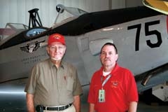 Jim Mills and  Bob Prater with a WWII-era Fairchild PT-19.