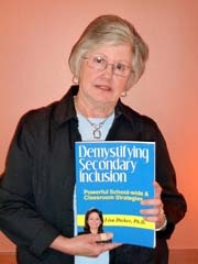 Linda Modenbach, president of the Learning Disabilities Association of Oklahoma, holds the hallmark textbook written by conference keynote speaker Dr. Lisa Dieker.