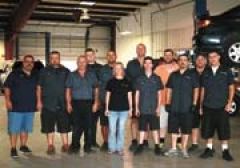 General Manager Alex Sordo and Service Manager Brian Knight, with the service staff at Car Country’s service facility in Sapulpa.