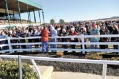 Crowds begin lining up early at the Will Rogers Downs Grandstands waiting for the Santa Cash drawing to begin.