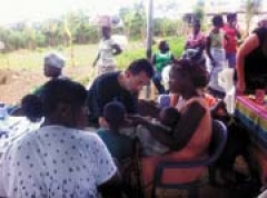 Dr. David Morris treats patients at a health clinic in Ghana.