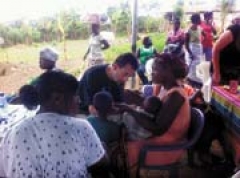 Dr. David Morris treats patients at a health clinic in Ghana.