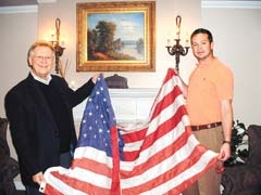 Frank Friedemann, director of family services, and Ryan Payne, funeral director of Musgrove-Merriott-Smith Funeral Service, help organize the annual Claremore Veterans Day parade.