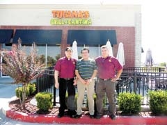 Cook Arturo Bergara and co-owners Francisco Barbosa and Gerardo Barbosa in front of the new Tijuana’s Grill &amp; Cantina in Bixby.