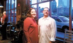 Whitney Parker, community development director for the Arthritis Foundation Eastern Oklahoma Chapter, and Dr. Ronald LaButti of Central States Orthopedic Specialists, medical chair of the Jingle Bell Run, at the event kick-off party.