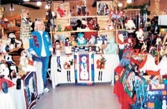 A vendor at the Holiday Arts and Crafts Show offers teddy bears, holiday décor and more.