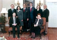 The Musgrove-Merriott-Smith staff: (Seated) Paul Merriott, retired funeral director; June Medlock, office manager in Inola; (Standing, L to R) Frank Friedemann, director of ­family services; Cindy and Jim Smith, owners and ­operators; Ryan Payne, funeral director; Denise Adamson, funeral director; and Charlie Bray, assistant. 
(Not pictured: Susan Bickford, Chelsea office manager.)