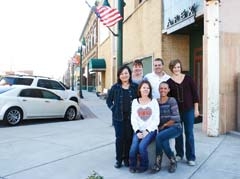 Claremore business owners of five unique storefronts invite you to shop downtown, not just for the holidays, but every day. Front row, seated from left: Cari Bohannan, Nesting ­Necessities &amp; Boutique; Savannah Rentie, Savannah’s ­Boutique; back row, standing from left: Sally Faust, Rusted Rabbit Resale; Susan Todd, Nesting Necessities &amp; Boutique; Jerry Fairchild and Eileen Skocdopole, Crafted: an Artisan Boutique. (Not pictured: Perry and Pamela Stafford, Perry’s Dogs.)