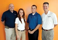 Bill Knight Ford Service Manager Bill Duensing, Quick Lane Assistant Manager Kate Collier and Manager Chad Ball, and Bill Knight, owner of Bill Knight Ford and Quick Lane Tire &amp; Auto Centers.