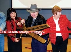 Jana Jae, world-renowned fiddler, Roy Clark, a living legend in the music industry, and Claremore Chamber President Dell Davis were on hand earlier this year for the ribbon ­cutting for the Roy Clark Music School at the Northeast Technology Center in Claremore.