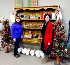 Susan Todd, co-owner of The District on Main, and Nikki Hall, sales clerk, look forward to serving customers during the Christmas season.