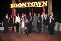 Boomtown Award winners (L to R): (front row) Scott Smith, Katie Plohocky, (back row) Evan Tipton, TYPros Executive Director Shagah Zakerion, Jessica Wiist, Hillary Parkhurst, Chris Miller, Nicole Swiggett, Dr. Gerry Clancy, James Wagner, Warren Unsicker, Justin Carpenter, Isaac Rocha and Toby Jenkins.