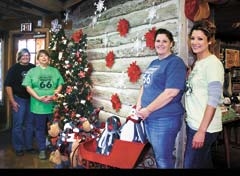 The ladies at The Nut House on Route 66 are ready for Christmas. The Nut House is known for its vast assortment of wonderful gifts and decorating ideas. (L to R): Tina Looney, Sally McSlarrow, Leslie Ward and Jennifer Downing.