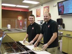 Manager Andre Casteel and General Manager James Gaddis at Top That! Pizza in Tulsa Hills.