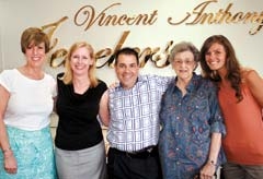 Staff members of Vincent Anthony Jewelers’ Tulsa store (L to R): Rhonda Amaro, Store Manager Connie ­Hill-Tinsley, Owner Lonnie Iannazzo, Geri Stribling, and 
Ashley Taylor. (Not pictured: Valorie Reynolds.)