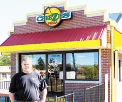CheeZies Pizza owner Dustin Jones provides value and quality with his low price carryout pizzas.