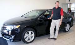 General Sales Manager Kevin McPhail displays the 2012 Toyota Camry.