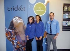 Sales associates Brittany Roothame and Ana Contreras with District Manager Devin Wyckoff at the 11th and Garnett Cricket location.