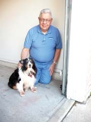 Jim Quintus, inventor of the Garage Butler, with his Sheltie, Glory.